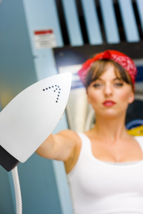 Chronic illness mother holding an iron